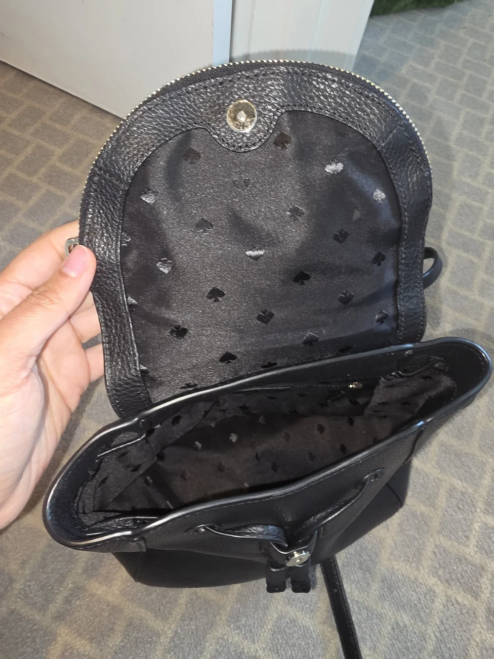 kate spade Black Pebbled Leather Drawstring Backpack